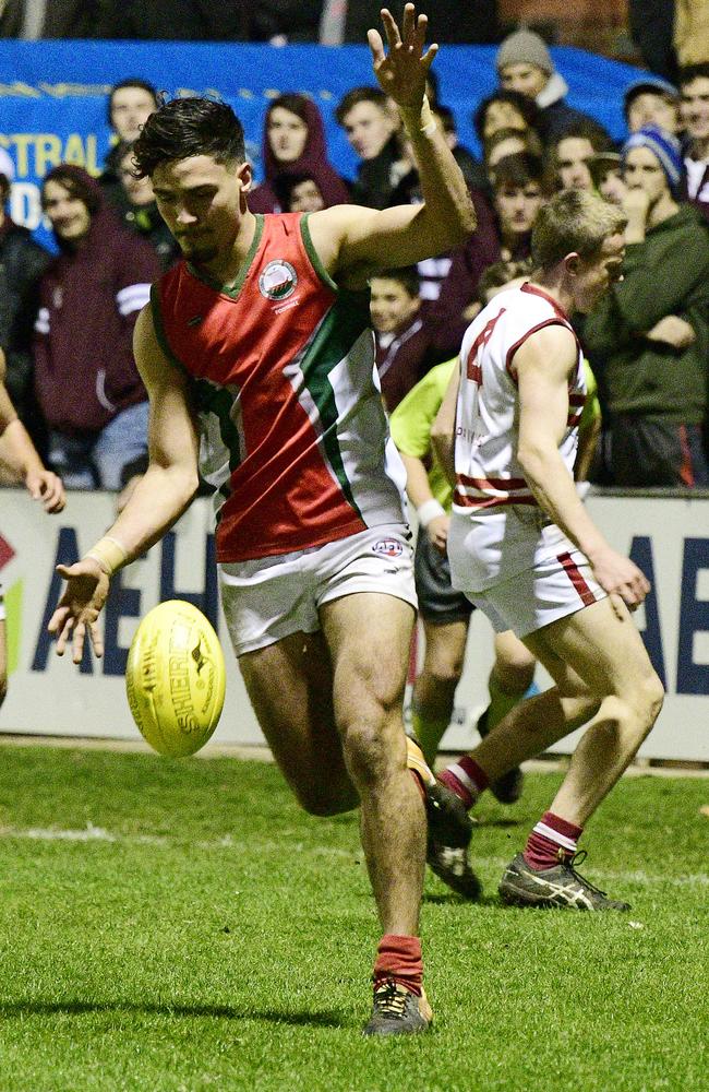 Henley High School's Izak Rankine with the ball against Prince Alfred College at the State knockout football final, at Norwood Oval. Picture: Bianca De Marchi