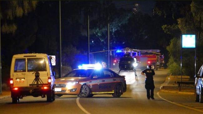 A rescue helicopter on the Yulara ring road outside the medical centre on Wednesday night, Picture: John Till