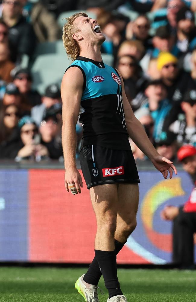 Jason Horne-Francis reacts after missing a goal against the Brisbane Lions. Picture: James Elsby/AFL Photos via Getty Images.