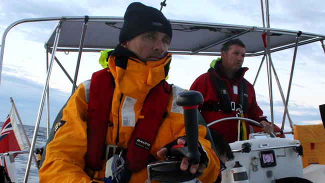 Alex Lomakin, 55, and David Hows, 46, during the Sydney Gold Coast Yacht Race aboard Ocean Gem. Photo: Shaya Laughlin