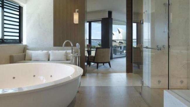 The Sydney Suite bathroom features a deep, jetted tub, a sauna and a walk-in shower room. Picture: Park Hyatt