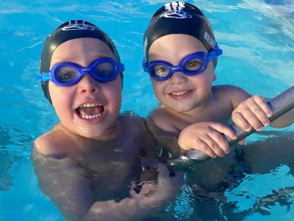 Siblings Hudson and Wolfe Heinemann-Little, aged 4 and 3, are both competent in the water.