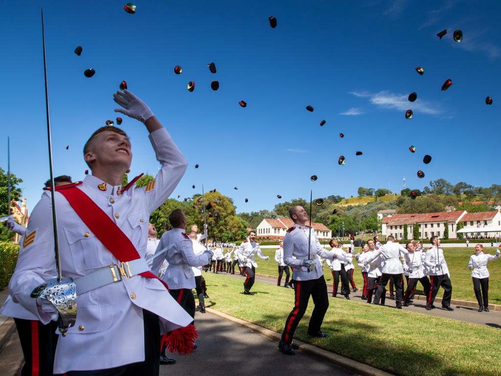 The 137th Graduating Class from the Royal Military College Duntroon celebrate by throwing their hats in the air on the completion of their graduation parade. Picture: supplied