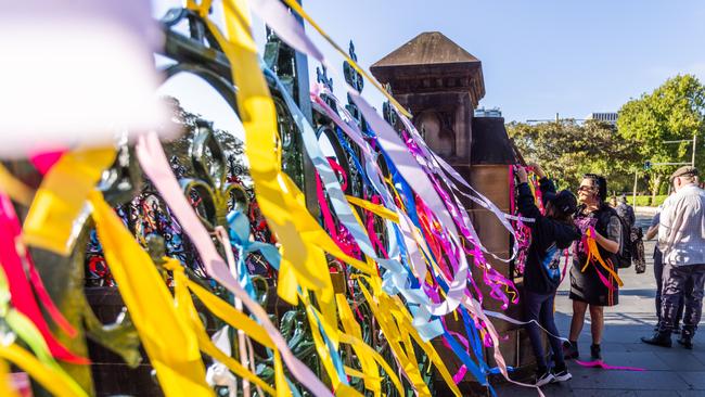 The fence was covered in colourful ribbons ahead of Cardinal Pell’s funeral. Picture: NCA NewsWire / Ben Symons