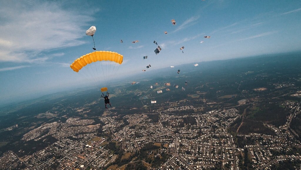 Brisbane radio host Stav Davidson dropped $10,000 in $5 notes during a skydive. Picture: Contributed