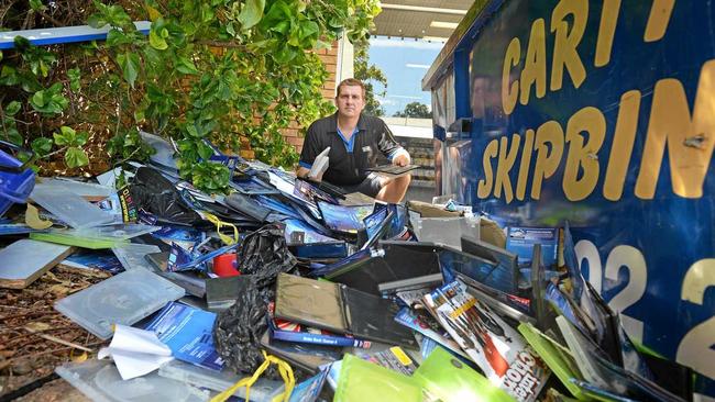 LOW-BLOW: Blockbuster Gympie David Kendall was in shock to find the outside of Blockbuster trashed. Picture: Renee Albrecht