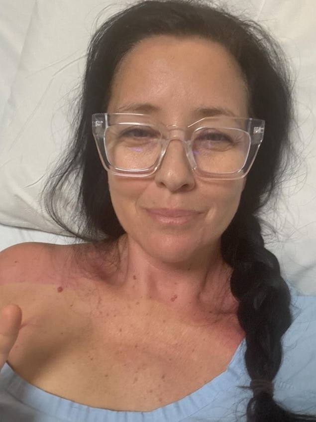 Ali Clarke in hospital after her first breast cancer surgery. Picture: Instagram