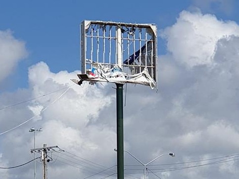 The derelict sign at Ashmore Plaza locals are calling an 'eyesore'. 