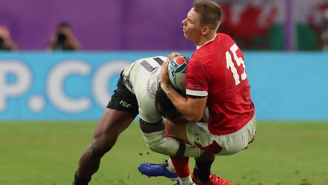 Liam Williams cops it full force. Photo: Koki Nagahama/Getty Images