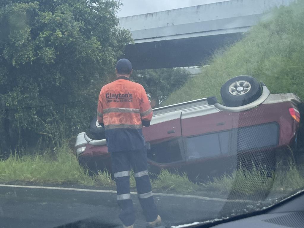 A car rollover at Pacific Paradise on Saturday afternoon marked a chaotic day on the Sunshine Coast, with multiple incidents keeping emergency crews busy. Photo: Sam Turner