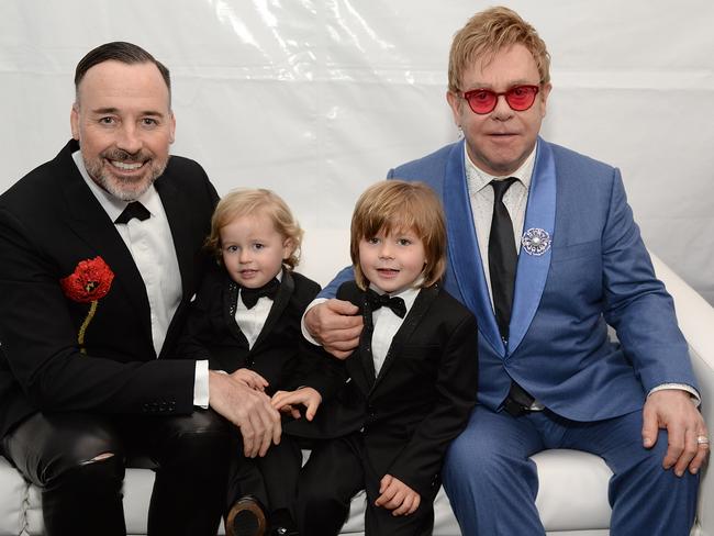 John, his husband David Furnish and their children Elijah and Zachary will all live in Australia while he tours. Picture: Michael Kovac