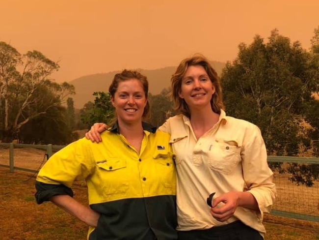 Game of chance: Sally and Genevieve Commins at Swifts Creek, where the Commins property was saved during last summer’s bushfires. Picture: Dannika Bonser