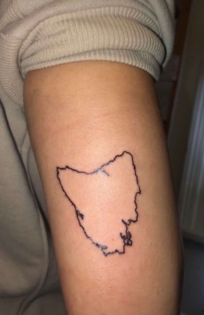 Professional footballer Bonnie Davies' tattoo of the outline of Tasmania on her arm. Picture: Supplied.