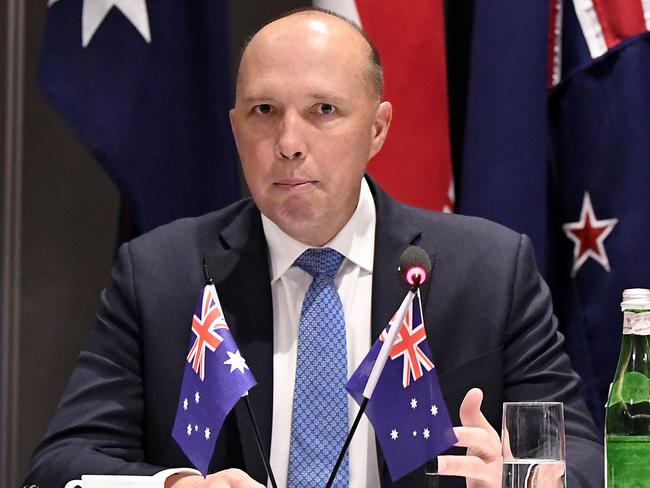 ‘Unwitting stooge’: Federal Minister for Home Affairs Peter Dutton at the 2018 Five Country Ministerial meeting on the Gold Coast on August 28. Picture: Dave Hunt