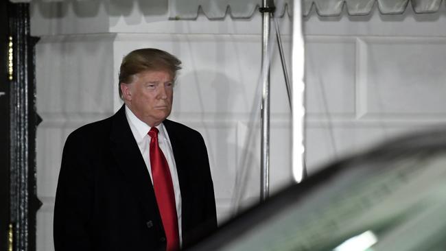 Donald Trump walks out of the White House on his way to the Capitol. Picture: AP.