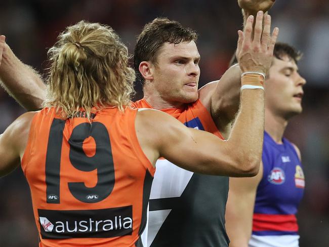 Giants Heath Shaw celebrates after kicking a goal with Giants Nick Haynes during AFL Preliminary Final match GWS Giants v Western Bulldogs at Spotless Stadium. Picture. Phil Hillyard