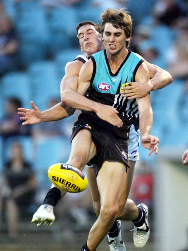 Justin Westhoff kicks under pressure in 2008 .