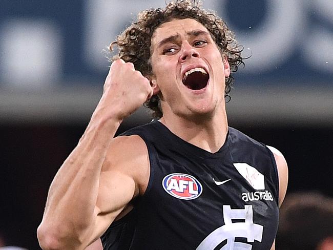 Charlie Curnow of the Blues reacts after kicking a goal during the Round 19 AFL match between the Gold Coast Suns and the Carlton Blues at Metricon Stadium at Carrara on the Gold Coast, Saturday, July 28, 2018. (AAP Image/Dave Hunt) NO ARCHIVING, EDITORIAL USE ONLY