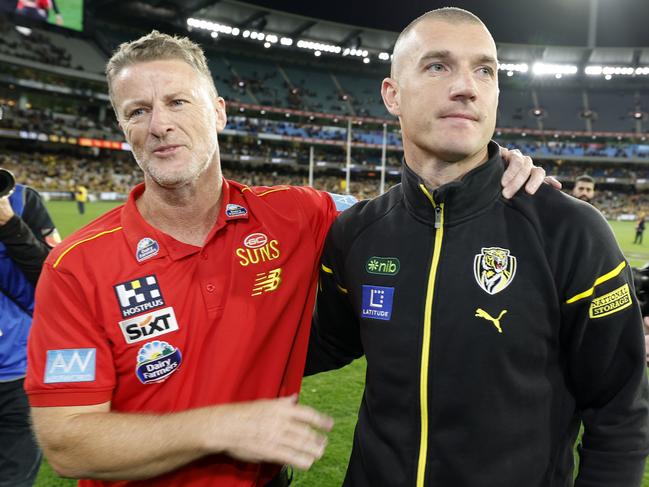 NCA. MELBOURNE, AUSTRALIA. August 24,   2024. AFL Round 24. Richmond vs Gold Coast Suns at the MCG.   Richmonds Dustin Martin  hugs old coach Damien Hardwick on the MCG during his lap of honour   . Pic: Michael Klein