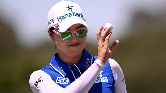 Minjee Lee of Australia smiles after sinking a birdie putt during the second round of the 2024 ISPS Handa Australian Open Golf tournament at the Kingston Heath Golf Club in Melbourne on November 29, 2024. (Photo by William WEST / AFP) / --IMAGE RESTRICTED TO EDITORIAL USE - STRICTLY NO COMMERCIAL USE--