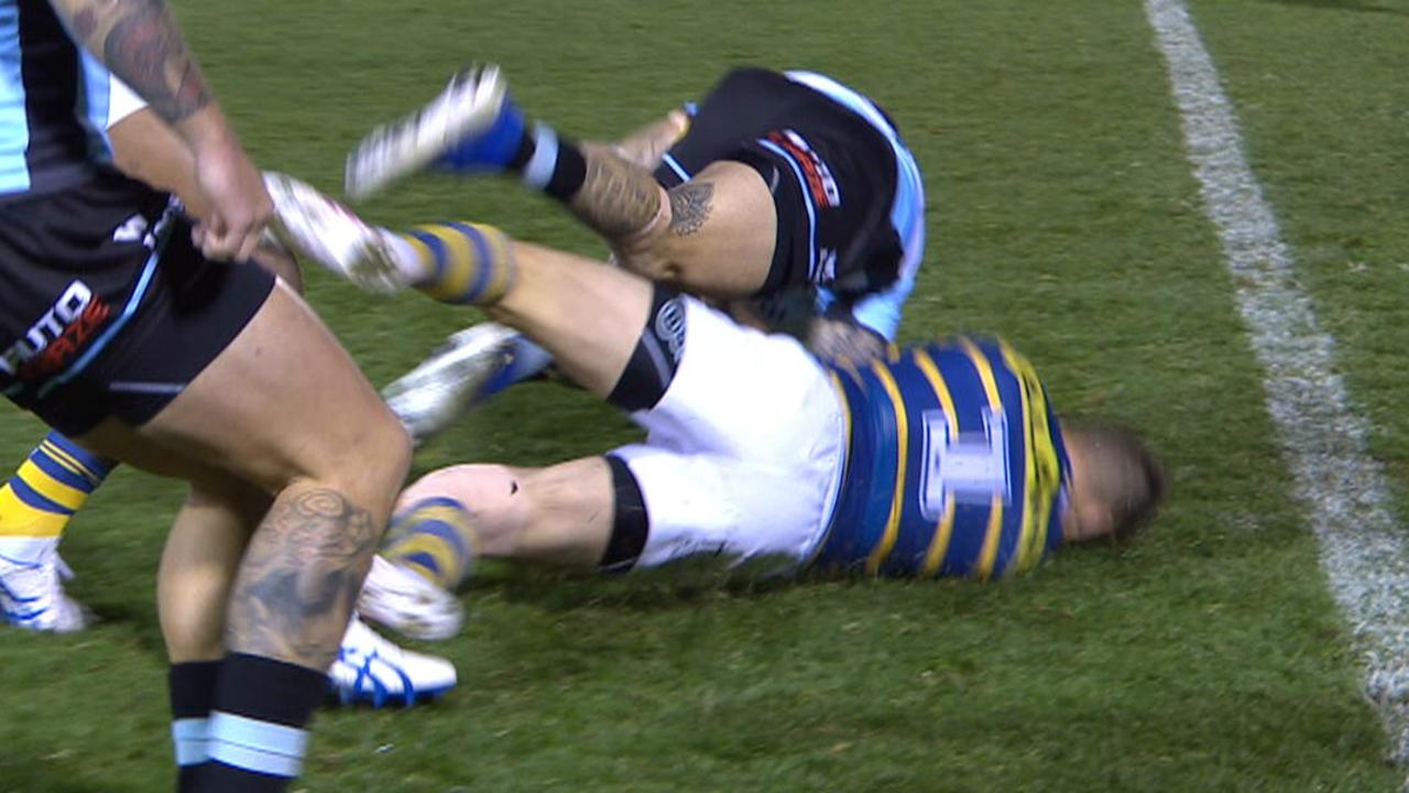 Clint Gutherson is knocked out by a Josh Dugan collision.