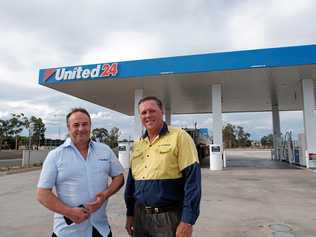 IN BUSINESS: United Petroleum food merchandiser Brian Glassel with Miles developer Glenn Tilly. Picture: Matthew Newton