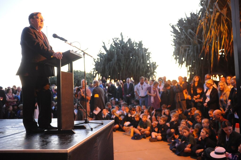 ANZAC DAY: Member for Hinkler Paul Neville addressing the large crowd at the Bargara Dawn Service. Photo: Mike Knott / NewsMail. Picture: Mike Knott