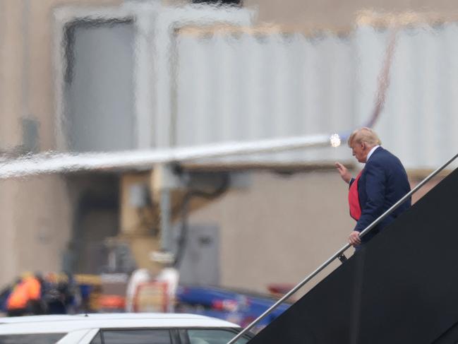 Donald Trump arrives in Virginia to be arraigned on four felony counts in federal court. Picture: AFP