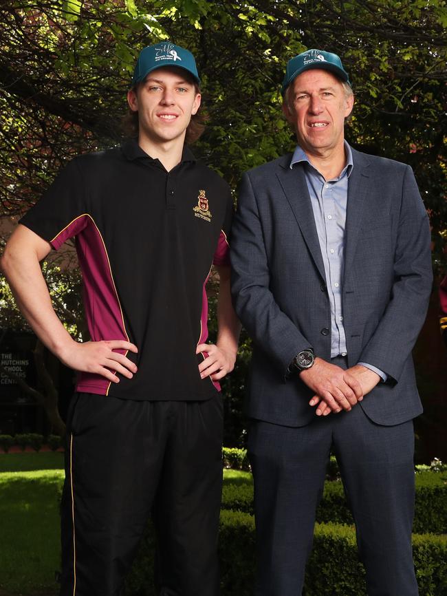 Luke Harris with dad Scott Harris at The Hutchins School last year, where Luke’s classmates ran a fundraising event for SHE. Picture: Nikki Davis-Jones