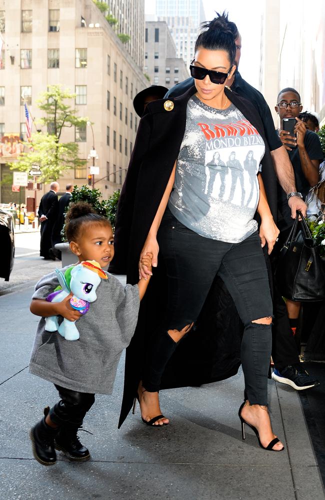 Kim Kardashian and North West enjoy a day out at Toys‘R’Us in New York City. Picture: Getty