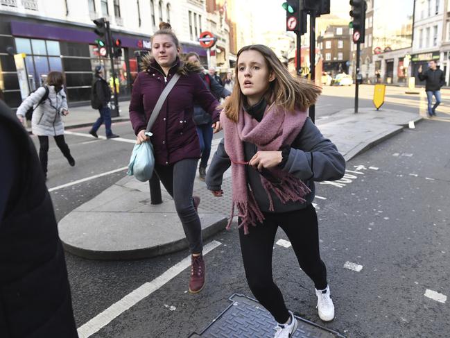 People are evacuated from London Bridge in central London during the attack. Picture: AP