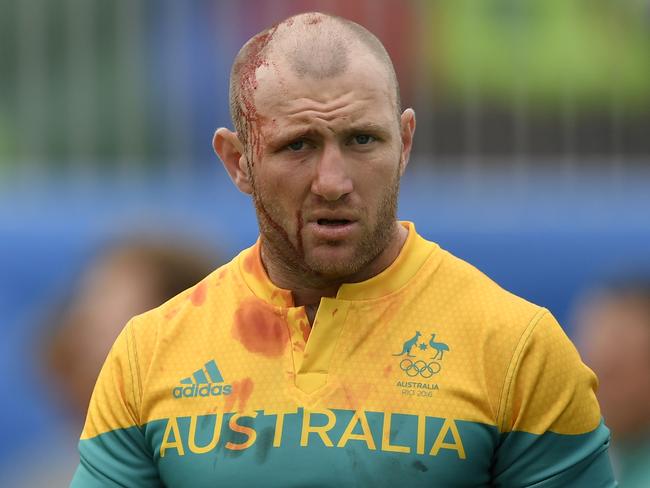 Australia's James Stannard looks on after the men’s rugby sevens match between South Africa and Australia during the Rio 2016 Olympic Games at Deodoro Stadium in Rio de Janeiro on August 10, 2016. / AFP PHOTO / PHILIPPE LOPEZ