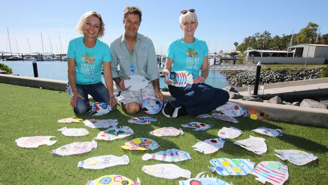 Artist David Day, centre, made‘Joe the Parrotfish’ from 60 thongs, 12 toothbrushes, 31 lighters, eight combs, six bullet cases and several bottle lids, fishing floats, lures, toys and other plastic wastes to highlight the role of the species in the ocean ecosystem.