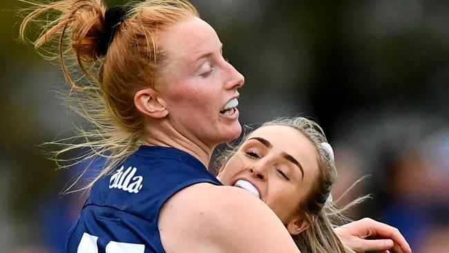 Geelong’s Aishling Moloney celebrates a goal against North Melbourne with Amy McDonald. Picture: Josh Chadwick/AFL Photos/via Getty Images