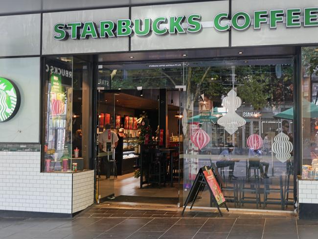 Palestine protesters on New Yers Eve spat on staff and stole some merchandise at a Starbucks cafe on Swanston Street. Picture: Valeriu Campan