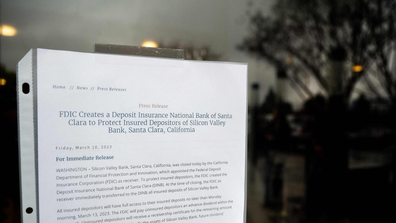 A notice informing of Silicon Valley Bank’s closure hangs at the bank’s headquarters. (Photo by NOAH BERGER / AFP)