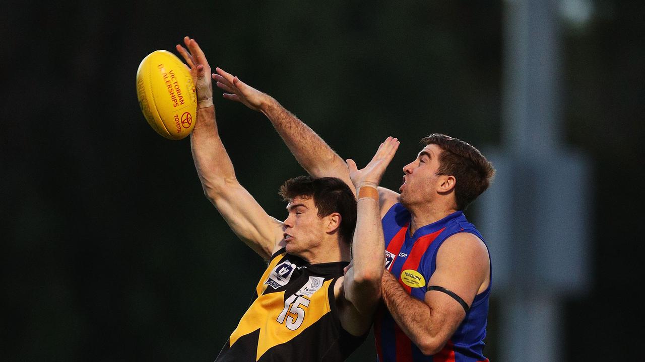 Sam Collins competes with Port Melbourne’s Jordan Lisle this season.