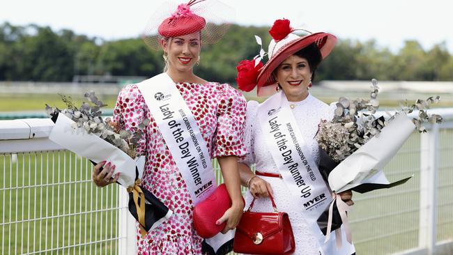 Tina Cahill won Lady of the Day and Frances Petersen was awarded runner up in the Fashions on the Field at the Cairns Jockey Club's Christmas Race Day, held at Cannon Park. Picture: Brendan Radke