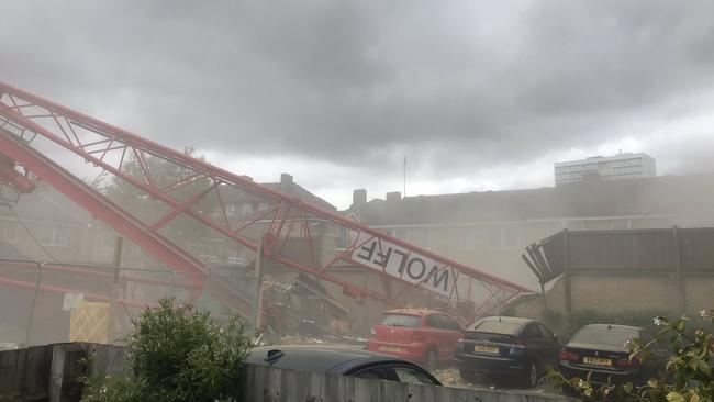 A crane collapse in London which damaged at least two house blocks. Picture: BRIDGET TEIRNEY