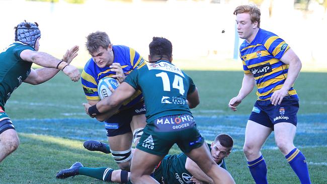 Sydney Uni’s Nick Champion de Crespigny muscles his way through the Randwick line. Picture: AAP IMAGE/ Danny Aarons