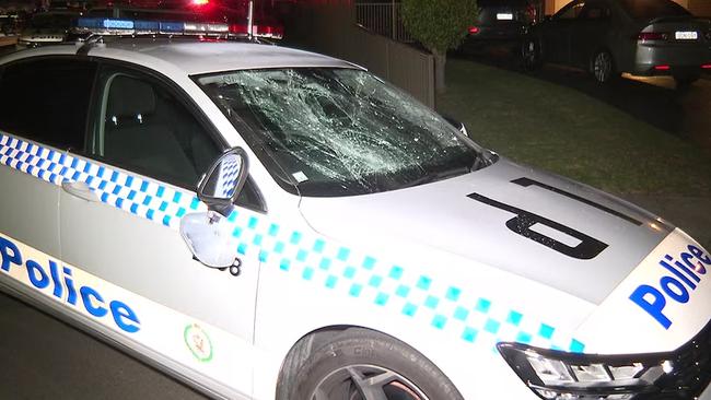 One of the NSW Police cars damaged by rioters. Picture: ABC