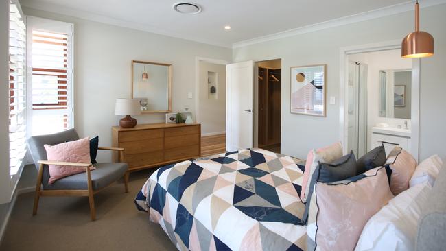 The master bedroom is at the front of the home and includes two walk-in robes and private ensuite.