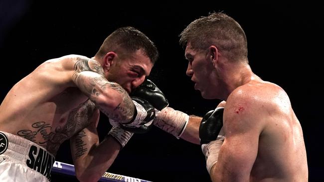 Liam Smith (right) and Sam Eggington battle.