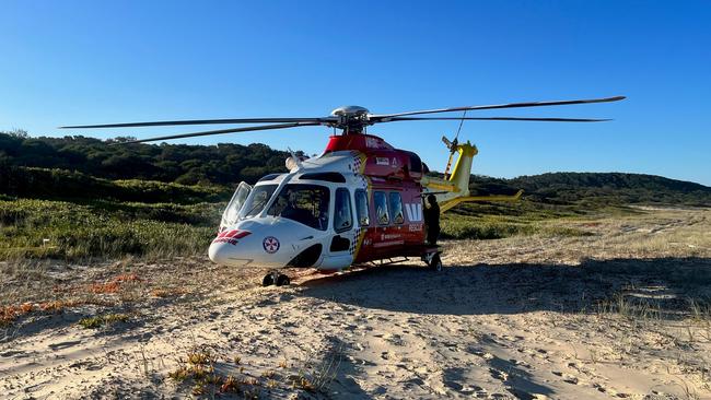 The Westpac Rescue chopper at Queens Head north of Port Macquarie after two men were swept overboard and made it to shore with serious injuries. They were flown to Newcastle's John Hunter Hospital.