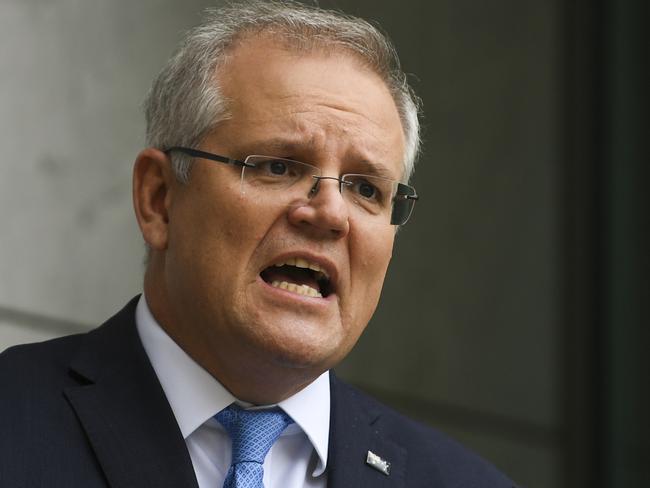 Australian Prime Minister Scott Morrison speaks to the media during a press conference at Parliament House in Canberra, Friday, April 3, 2020. (AAP Image/Lukas Coch) NO ARCHIVING