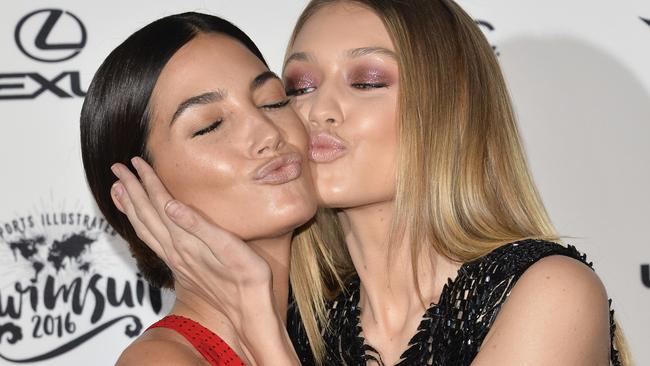 Models Lily Aldridge, left, and Gigi Hadid attend the 2016 Sports Illustrated Swimsuit Issue launch party at Brookfield Place on Tuesday, Feb, 16, 2016, in New York. (Photo by Evan Agostini/Invision/AP)