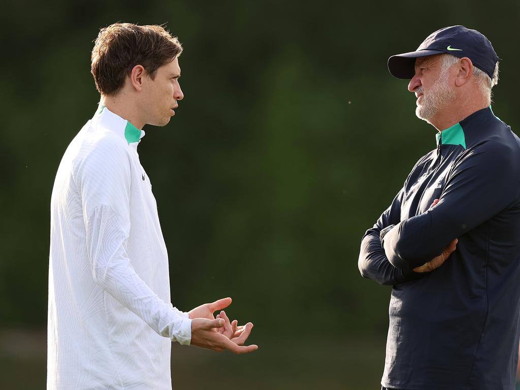 Craig Goodwin (left) and Socceroos coach Graham Arnold have a deep discussion at training. Picture: Robert Cianflone/Getty Images