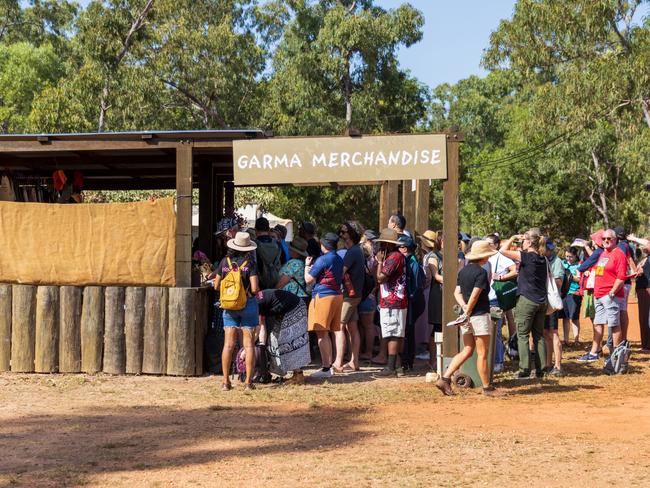 People queue in line at the Garma Merchandise store during Garma Festival 2022 at Gulkula on July 29, 2022 in East Arnhem, Australia. Picture: Tamati Smith/Getty Images