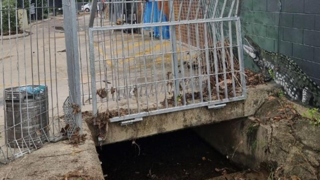 The grate has been left lifted up after Saturday's flooding in Edge Hill Village. Picture: Supplied