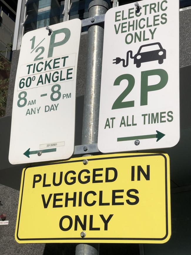 Signs for an electric vehicle charging station in Adelaide. Picture: File